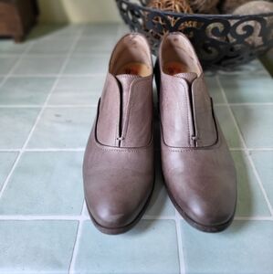 Frye ankle boots.